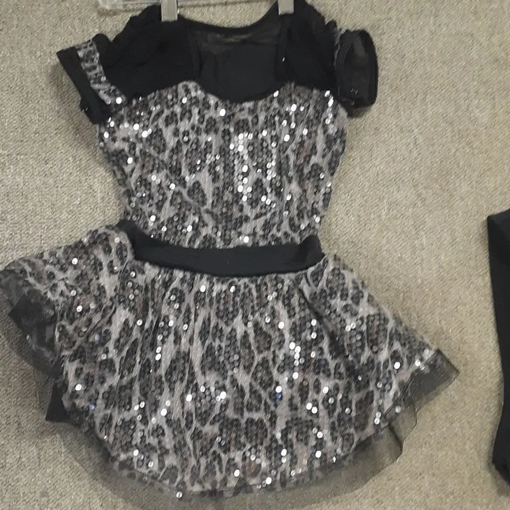 Beautiful leopard black and pink dance leotard and black tights‎ to go with it.